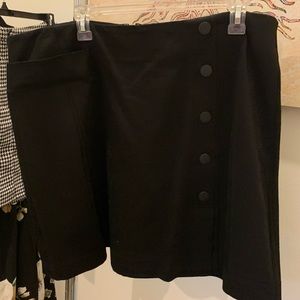 black, cotton mini skirt with accent buttons